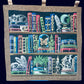 Embroidered bookshelf wall hanging
